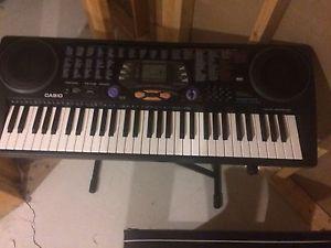 Casio keyboard, with stand and bench, works perfect