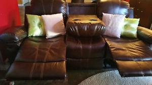 Moving sale!!!leather recliner never used 5 month old !!!!!
