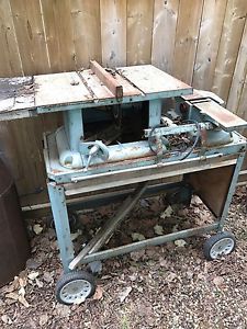 Old table saw with planer