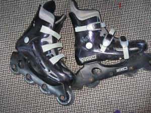 Pair of size 8 womens rollerblades