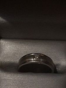 Silver wedding band with Gold strip across front & diamond