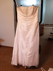 Beautiful crystal wedding gown with crystal vail and wrap