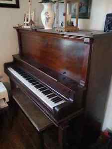 Upright piano and bench