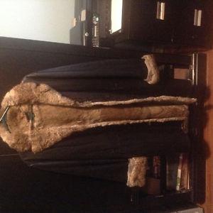 Woman's size small 3/4 lengh Danier leather jacket