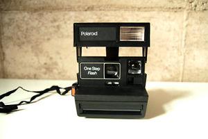 vintage collector Polaroid instant camera with flash