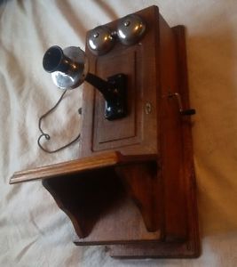 Antique wooden, crank, wall phone