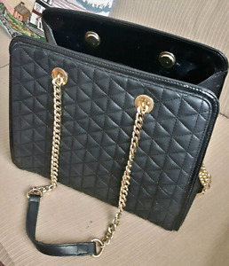 Bebe black and gold purse