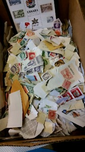 Box of world POSTAGE STAMPS