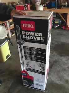 Brand new Toro 12" Power Shovel