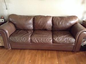 Brown real leather Coja couch and love seat from Barnaby's