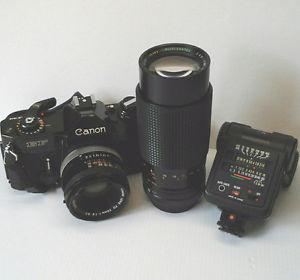 Canon EF Film SLR camera with 2 lenses and flash