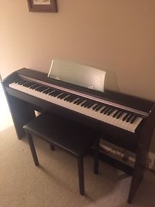 Casio electric piano PX 700