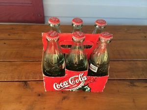 Collection of Six Coca-Cola Bottles