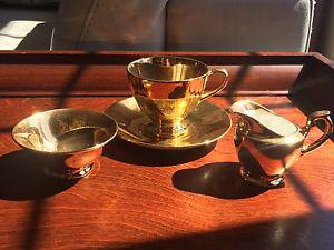 Gold porcelain cup Saucer and sugar & cream