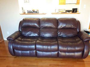 Leather couch and oak hutch