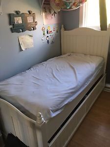 EUC trundle bed, white with mattress. Trundle is on wheels