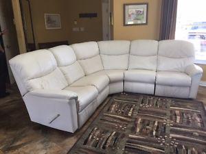 Like new! Beautiful white leather sectional
