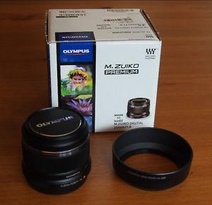 Olympus 25mm lens for Micro .- firm