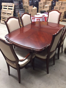 Table with leaf and 8 chairs