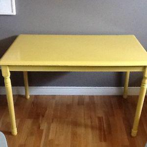 Yellow wood table with 4 chairs