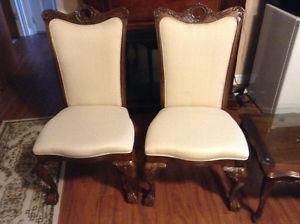 2 white side living room chairs