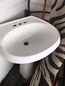 Bathroom pedestal sink in good condition