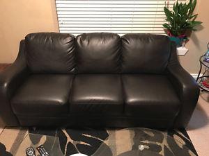 Black faux leather sofa