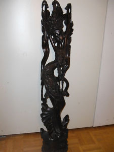 Carved ebony dancing girl statue
