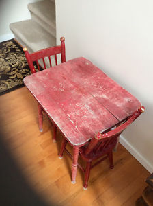 Child's rustic red table and two chairs