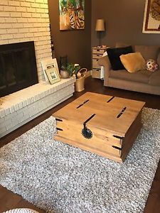 Coffee table-opens for storage