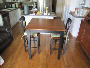 Counter height table and 2 chairs $
