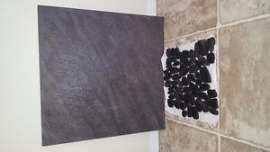 Grey floor tile with black pebble