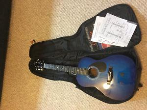Jay jr guitar with strap, case and learning book & papers