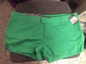 Ladies green Volcom shorts, size 11 - NEVER WORN