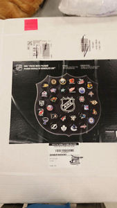 NHL official pucks wall plaque