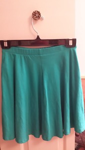 Never worn, teal mini skirt