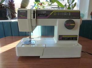 Singer Sewing Machine $ 130