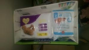 Size 1 diapers unopened and size 2 opened one missing