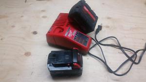TWO Milwaukee MAH BATTERIES WITH CHARGER