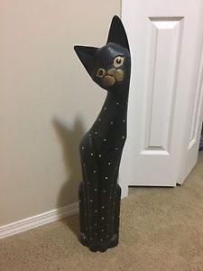 Tall wooden decorative cat