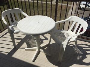 White deck furniture -small table and two chairs