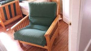 2 heavy duty wood lawn chairs with large cushions and foot
