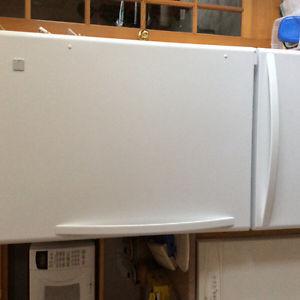 6 year old white bottom freezer fridge for sale. Kenmore
