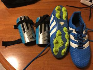 Adidas soccer cleats and shin pads size 4 youth