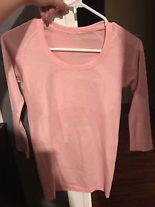 Light pink/coral 3/4 length lululemon shirt