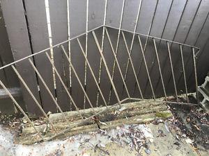 Metal stair rail.