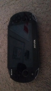 Ps vita with memory card and game