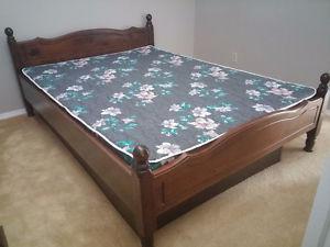 Queen Bed, foam mattress dark wood surround