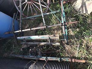 Antique wagon parts frame and wagon wheels