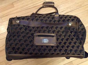 Designer luggage weekend bag, with wheels, as new, MUST be